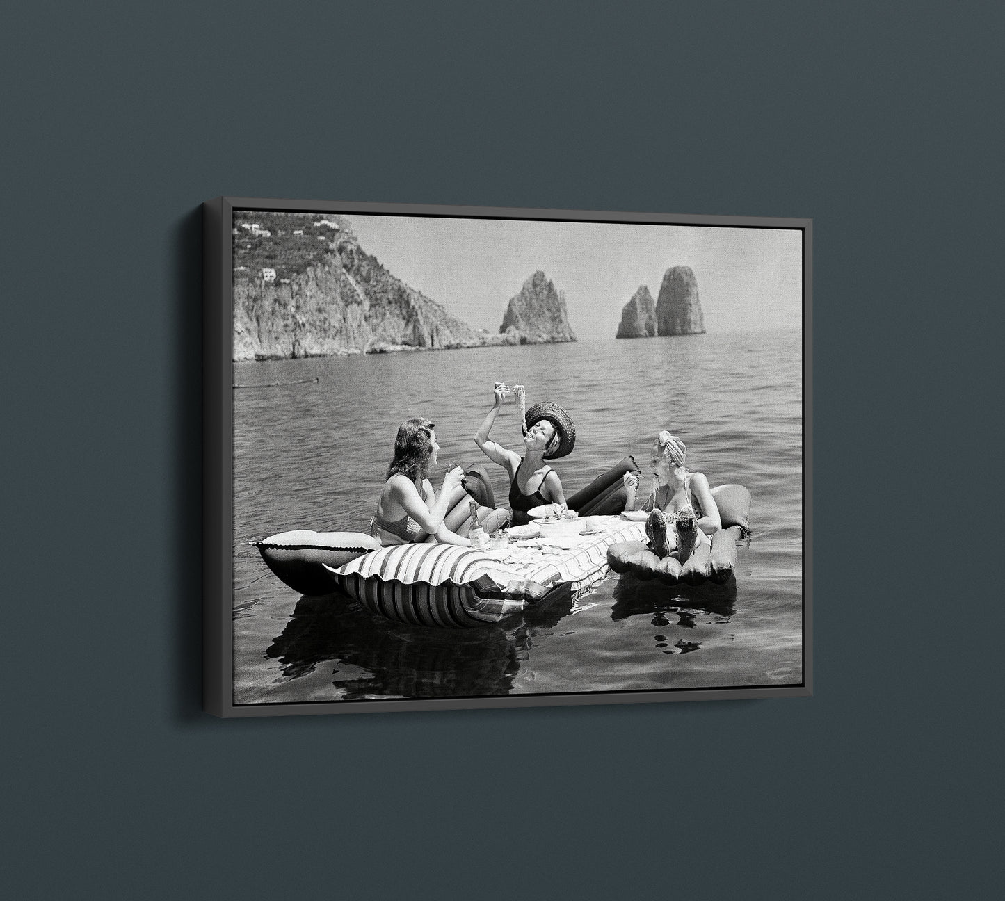 Floating Luncheon Canvas Wall Art | Three young women eat spaghetti on inflatable mattresses at Lake of Capri 1939 - PPL11